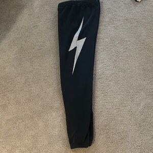 Kids Black Joggers with Silver Lightning Bolt
Unisex joggers